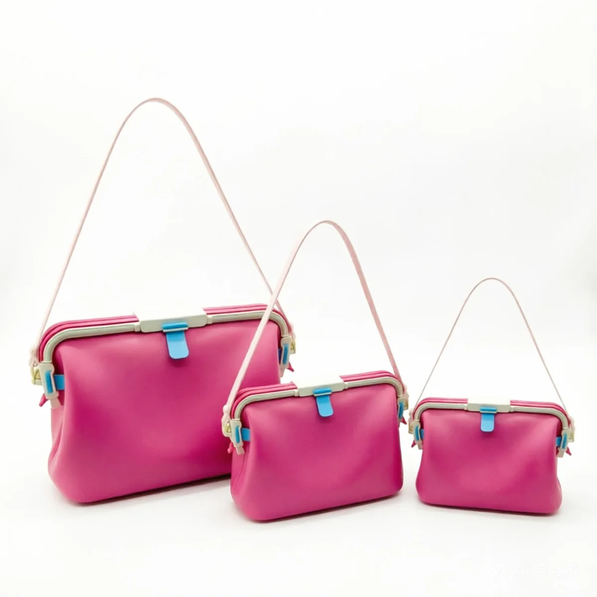 Magenta snap-frame silicone bags in three sizes